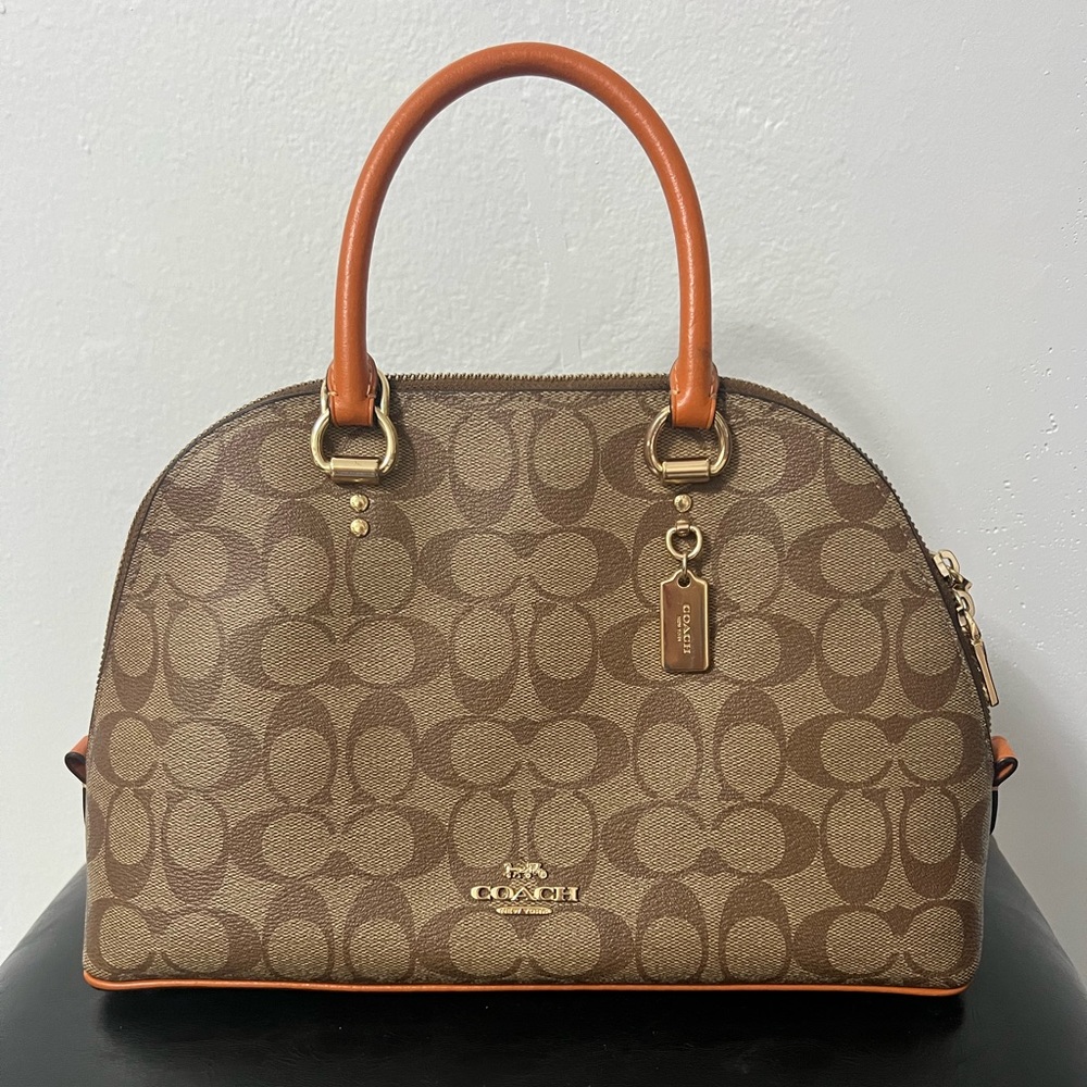 Coach orange bag with cross body strap